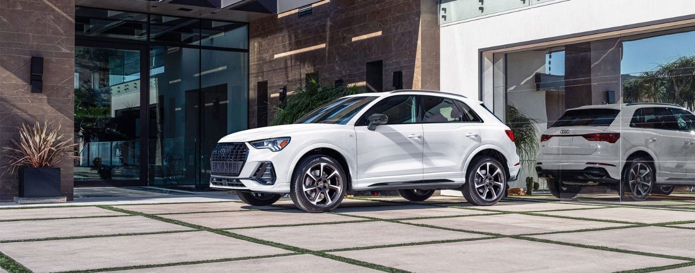 A white 2025 Audi Q3 for sale parked on a driveway.